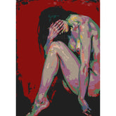 Nude woman curled up colorful red background