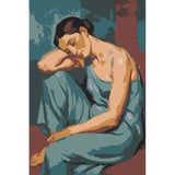 Nude woman sitting blue dress thoughtful