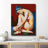 A seated nude woman against a red background with expressive posture and modern colors. DIY art wall decor modern artwork